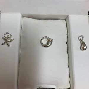 <Solid silver necklace charms >